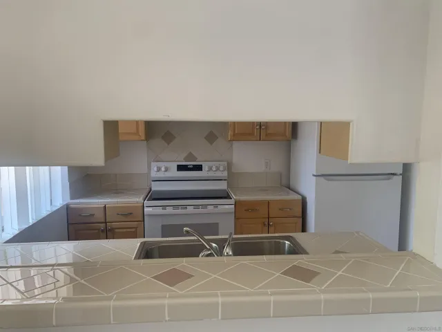 a bedroom with a bed and a cabinets