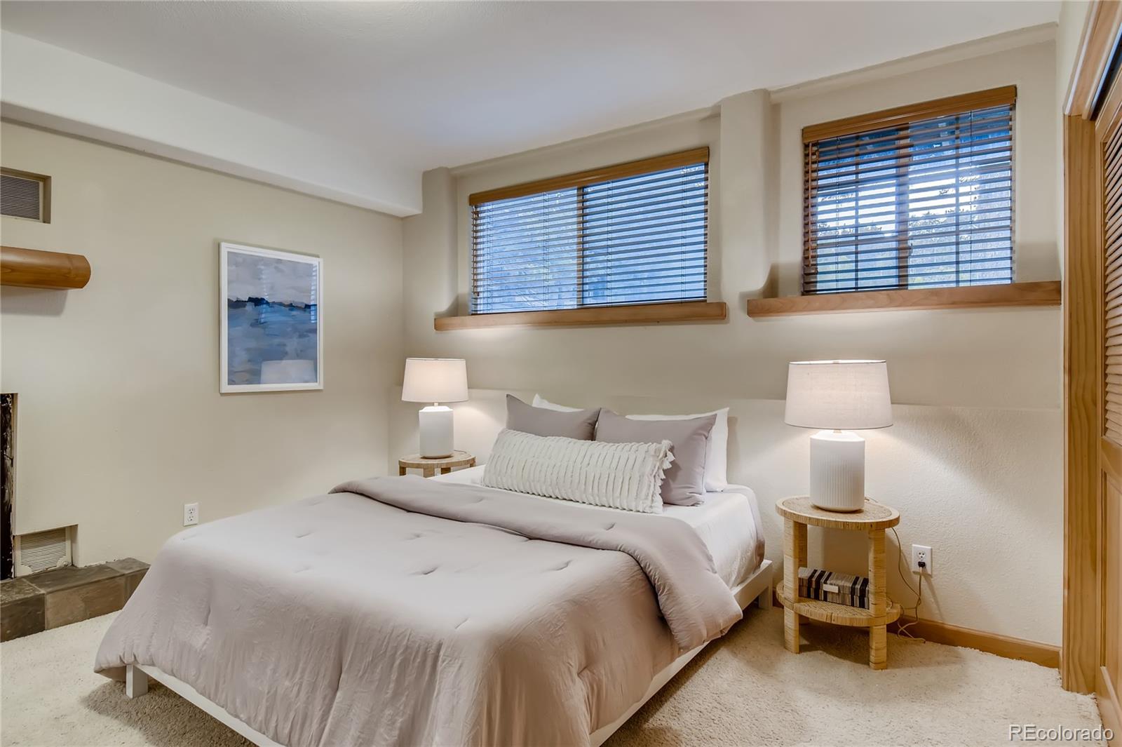 32104 Snowshoe Road Evergreen, CO 80439 - Photo 14 of 36 a bedroom with a bed and window