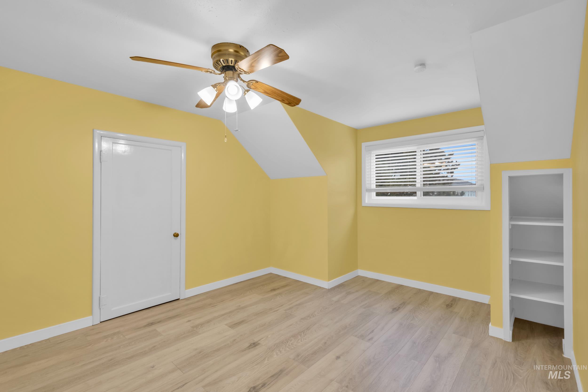 1158 South Powerline Road Nampa, ID 83686 - Photo 32 of 50 Additional living space with light wood finished floors and ceiling fan