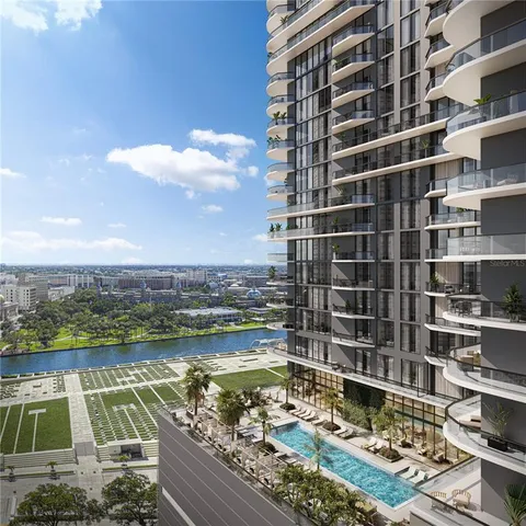 a view of a lake with building in front of it