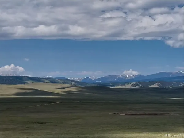 a view of lake with mountain