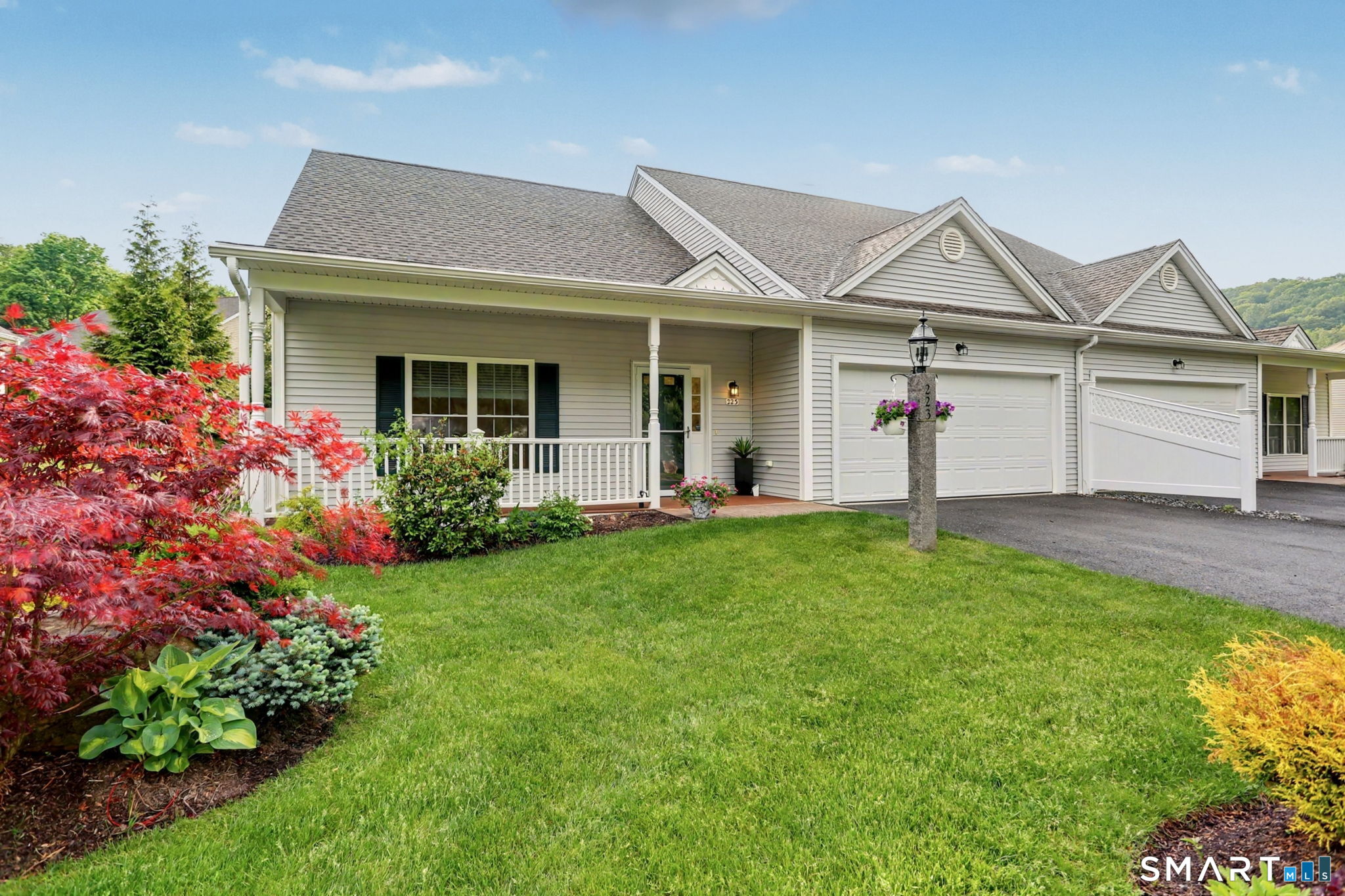 223 Meadow Brook Road, Unit 223 Oxford, CT 06478 - Photo 2 of 34 a view of a house with garden