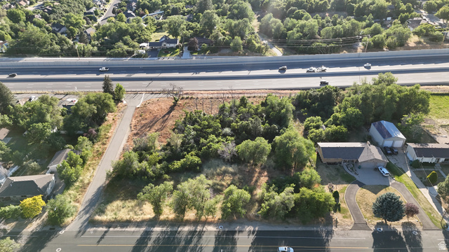 1792 Valley View Drive Layton, UT 84040 - Photo 9 of 18 Expansive undeveloped parcel featuring mature trees and direct street frontage