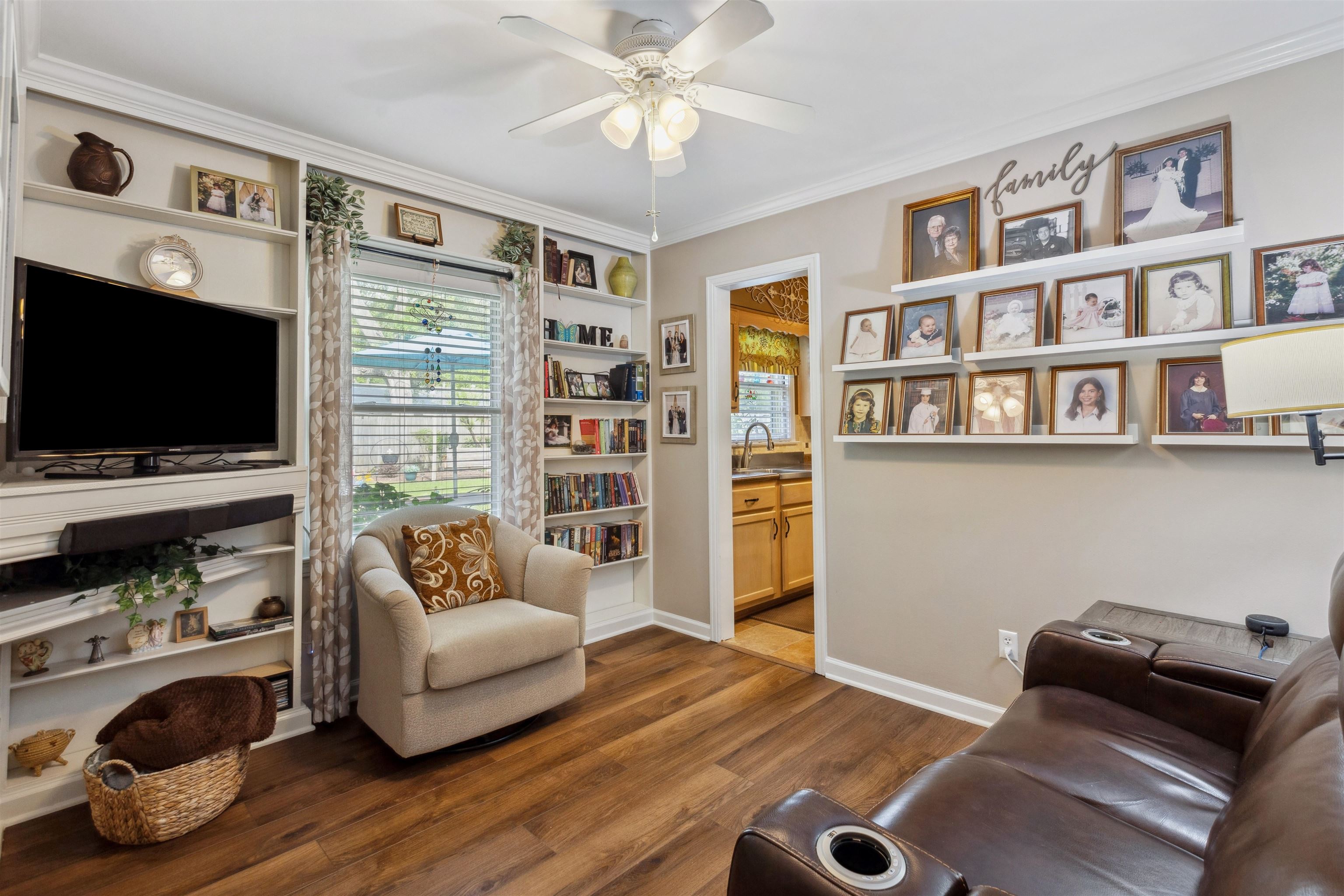 1631 Hopewell Road Memphis, TN 38117 - Photo 7 of 22 a living room with furniture and a flat screen tv