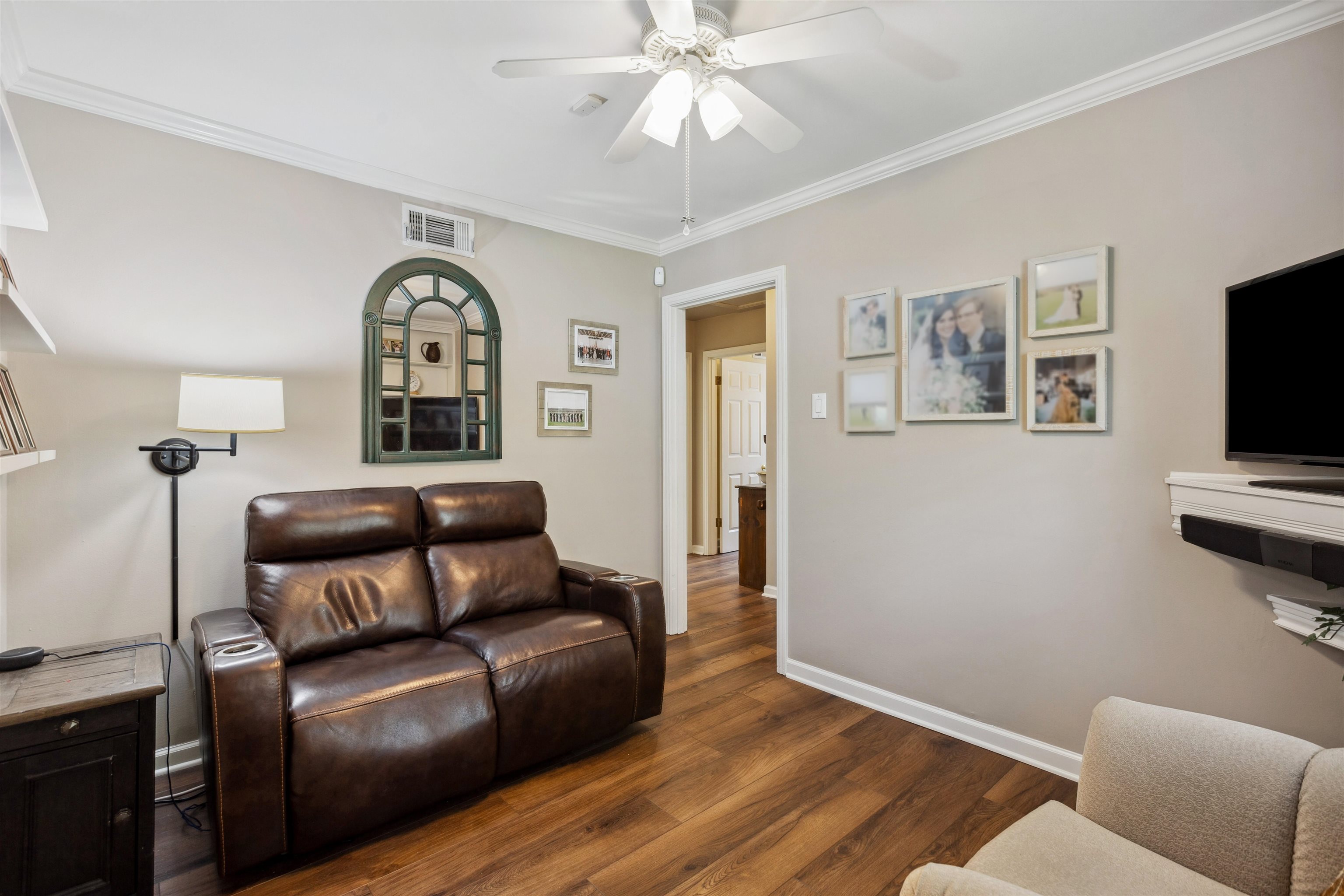 1631 Hopewell Road Memphis, TN 38117 - Photo 8 of 22 a living room with furniture and a flat screen tv