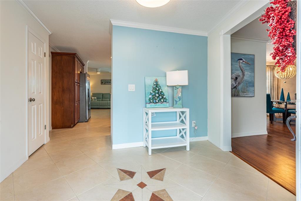 910 Chipaway Drive Apollo Beach, FL 33572 - Photo 2 of 39 a view of a livingroom with furniture and an empty room