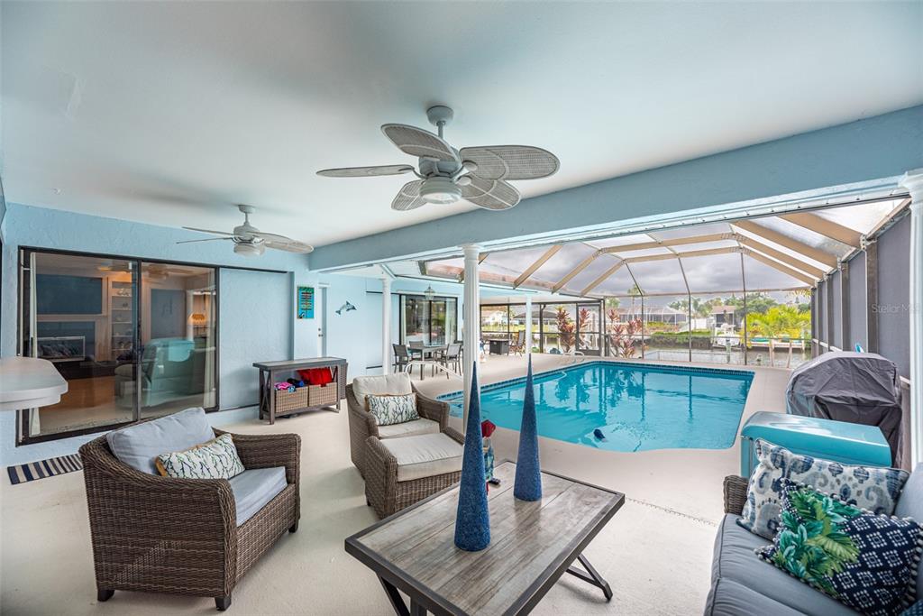 910 Chipaway Drive Apollo Beach, FL 33572 - Photo 23 of 39 a living room with furniture and a table