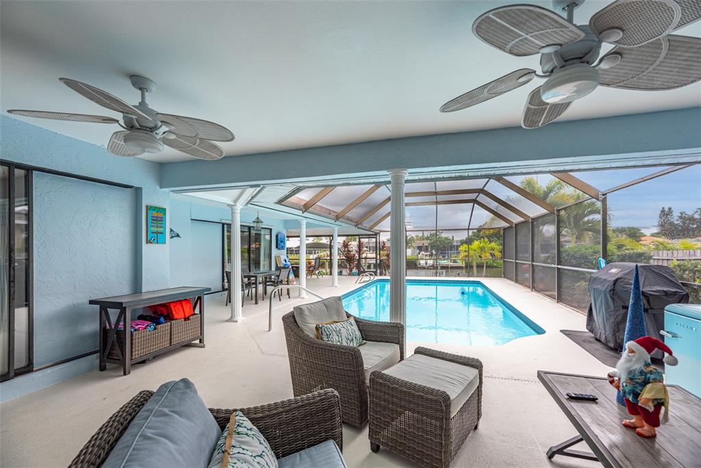 910 Chipaway Drive Apollo Beach, FL 33572 - Photo 25 of 39 a living room with furniture and a flat screen tv