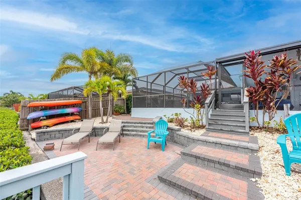 a backyard of a house with seating space