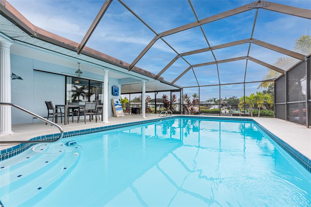 910 Chipaway Drive Apollo Beach, FL 33572 - Photo 30 of 39 a view of a swimming pool with a patio