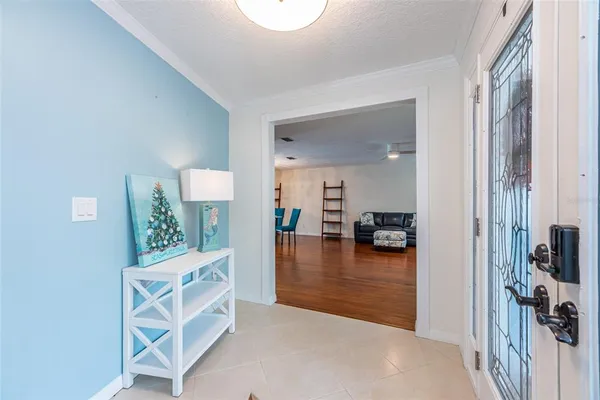 a view of a livingroom with furniture and a flat screen tv