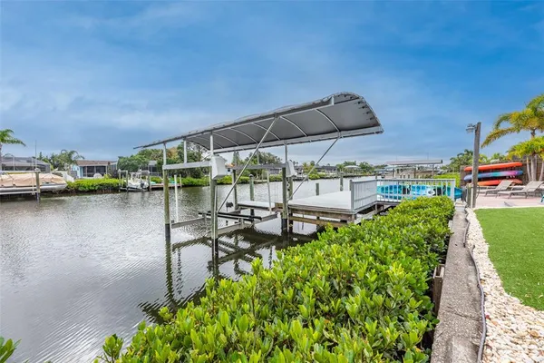 a view of a lake with sitting area