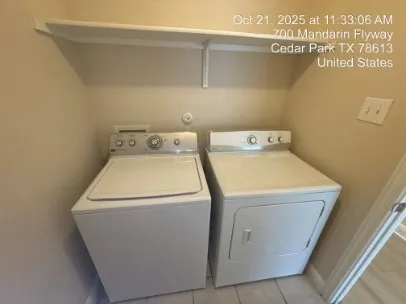 a utility room with dryer and washer