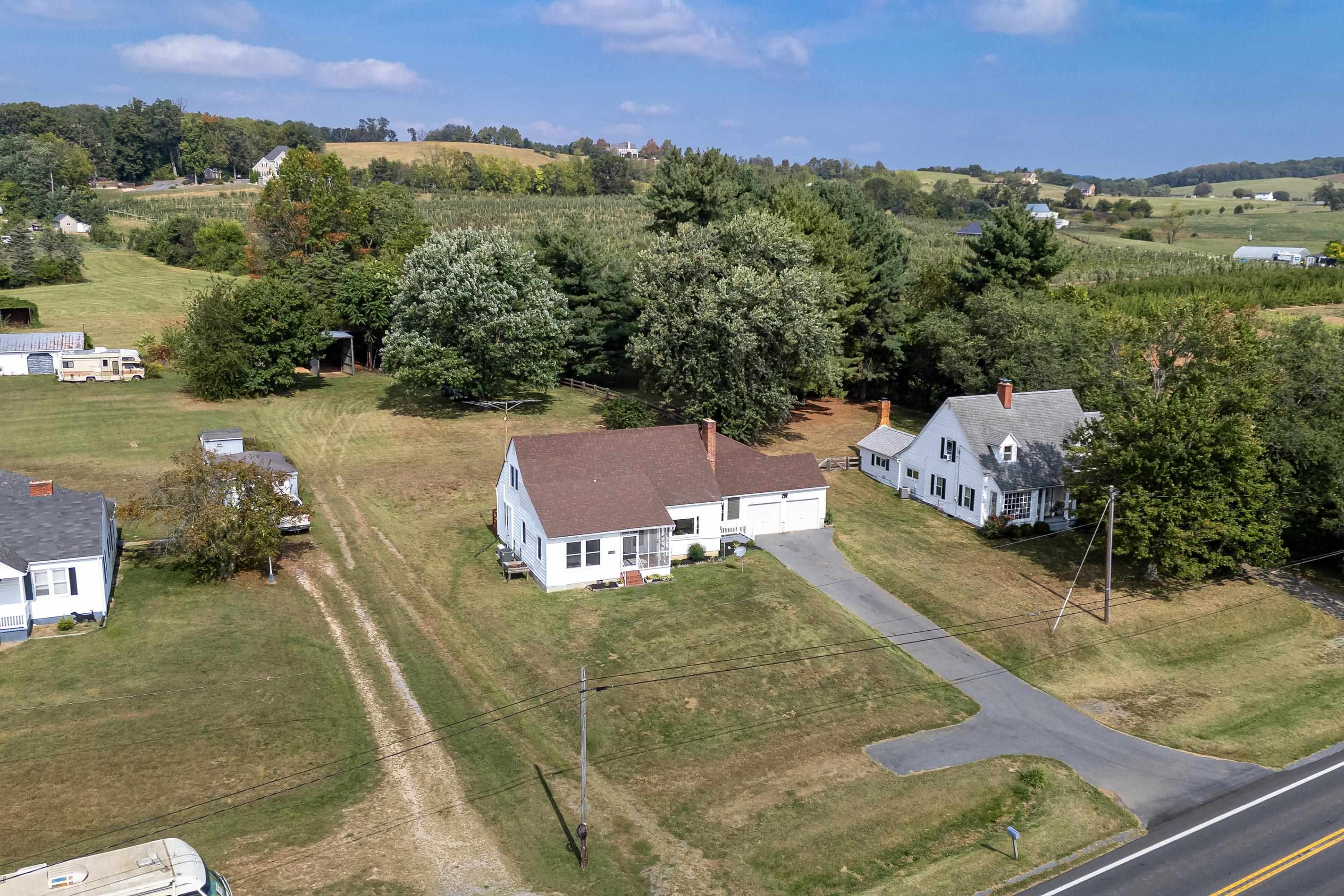 3138 Cross Keys Road Harrisonburg, VA 22801 - Photo 67 of 74 The aerial view highlights the overhead view of the spacious lot, farmland nearby the home, mountains offering beautiful views, and much more!