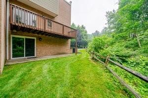 101 Fall Run Road Pittsburgh, PA 15221 - Photo 27 of 30 a backyard of a house with lots of green space