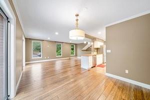 101 Fall Run Road Pittsburgh, PA 15221 - Photo 7 of 30 a view of a house with wooden floor and a large window