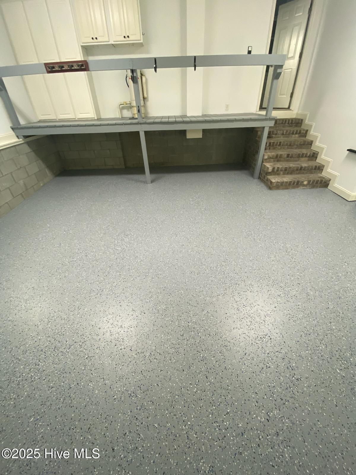 609 Long Point Road Chocowinity, NC 27817 - Photo 6 of 71 GARAGE VIEW LEADING UP TO ENTRANCE IN LAUNDRY ROOM/NEW PAINTED FLOOR