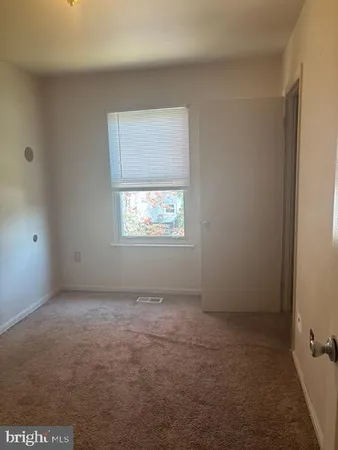 a bathroom with a toilet a sink and bathtub