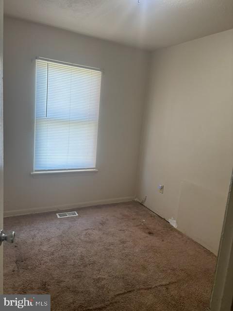 5104 Emo Street Capitol Heights, MD 20743 - Photo 17 of 24 an empty room with a window