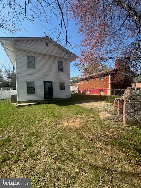 5104 Emo Street Capitol Heights, MD 20743 - Photo 18 of 24 a view of a house with a yard