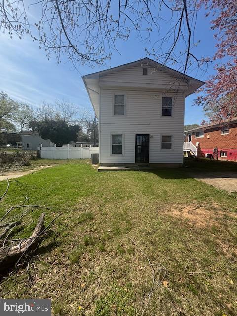 5104 Emo Street Capitol Heights, MD 20743 - Photo 19 of 24 a front view of a house with a yard
