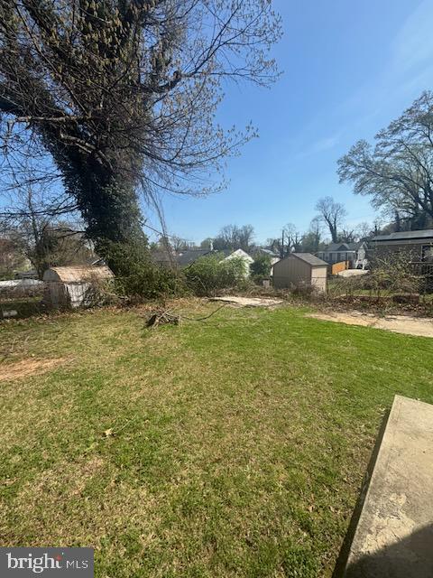 5104 Emo Street Capitol Heights, MD 20743 - Photo 20 of 24 a view of a yard with an outdoor space