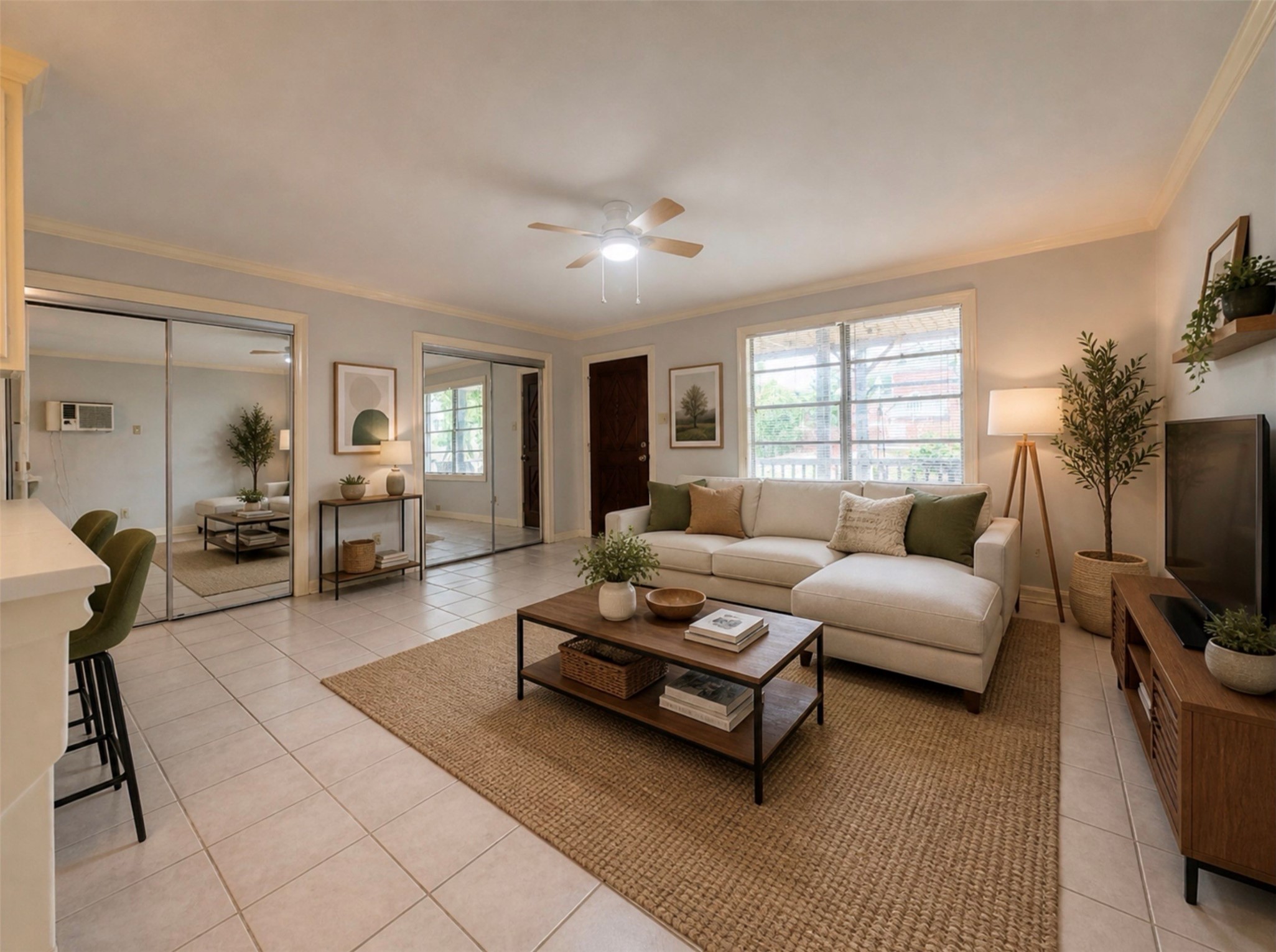 613 Pacific Street, Unit 1 Houston, TX 77006 - Photo 7 of 28 a living room with furniture and a flat screen tv