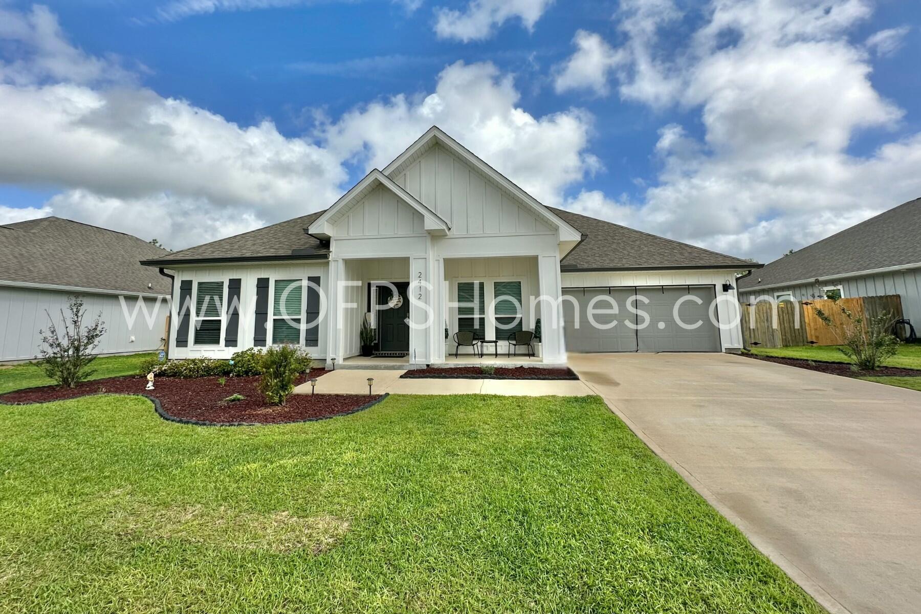 2412 Dakota Way Crestview, FL 32536 - Photo 1 of 43 a front view of house with yard and green space