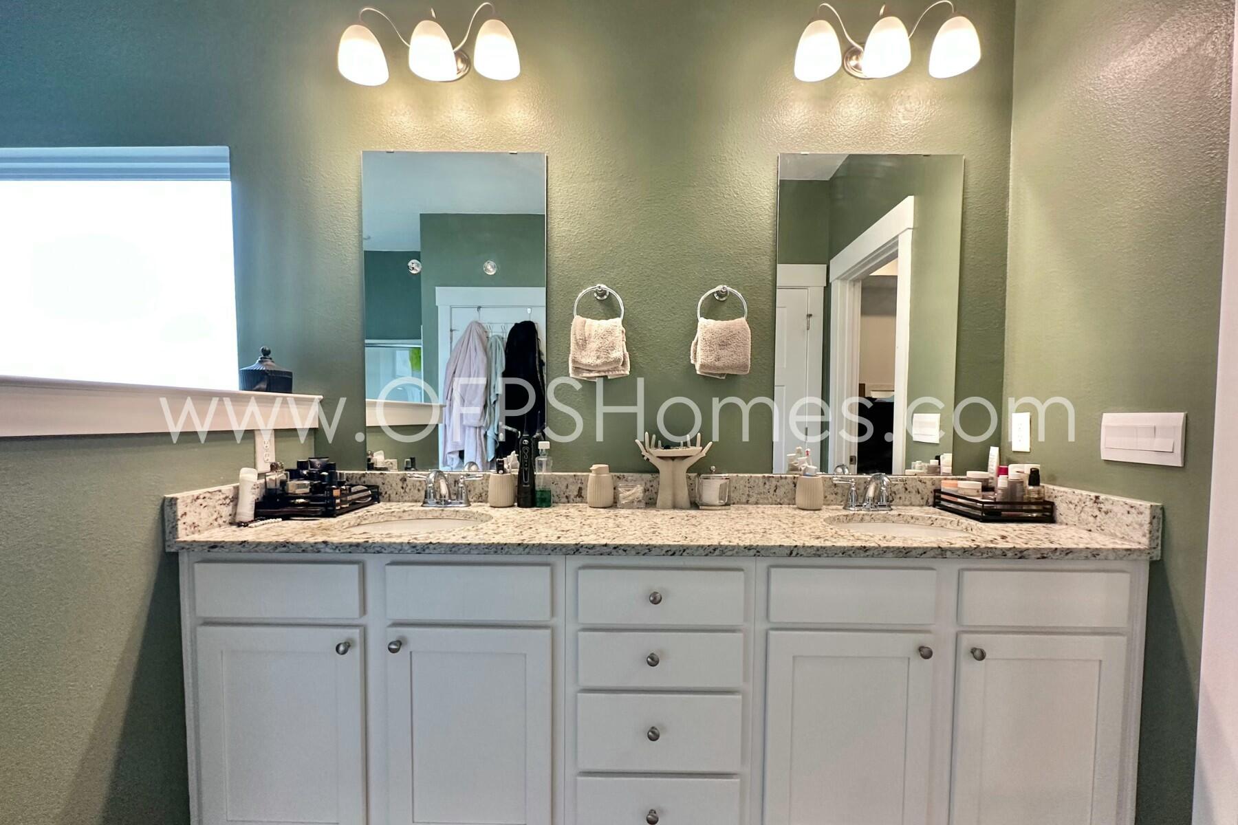 2412 Dakota Way Crestview, FL 32536 - Photo 12 of 43 a bathroom with a sink and a mirror