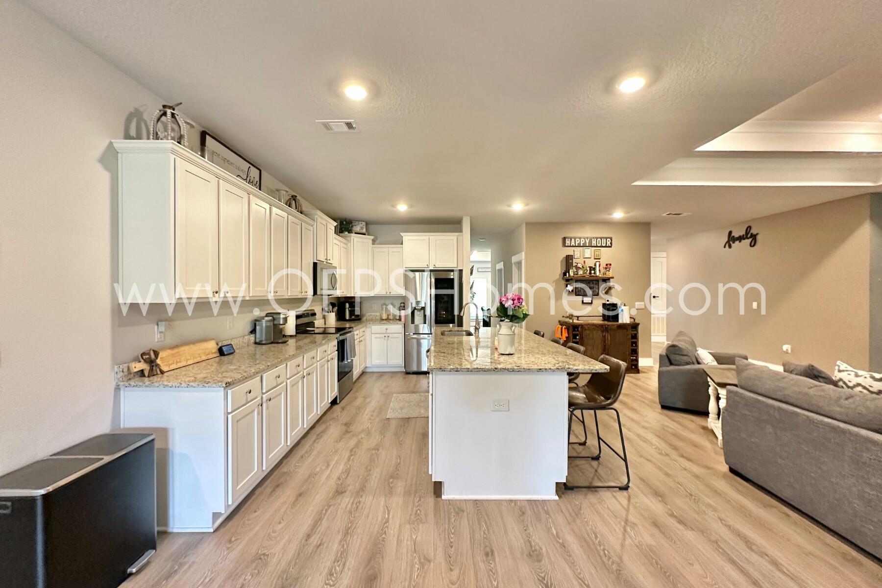 2412 Dakota Way Crestview, FL 32536 - Photo 27 of 43 a large kitchen with lots of counter space a sink and appliances