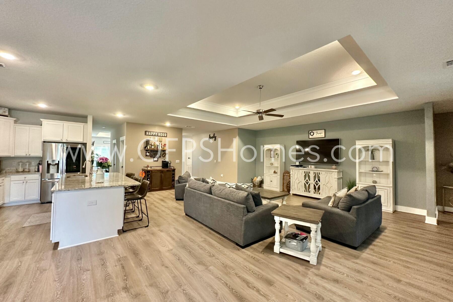 2412 Dakota Way Crestview, FL 32536 - Photo 28 of 43 a living room with furniture and wooden floor