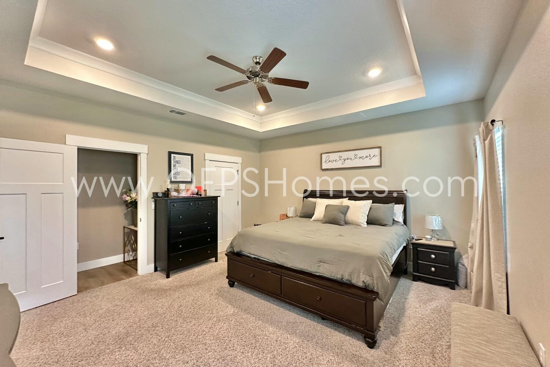 2412 Dakota Way Crestview, FL 32536 - Photo 29 of 43 a spacious bedroom with a bed and ceiling fan