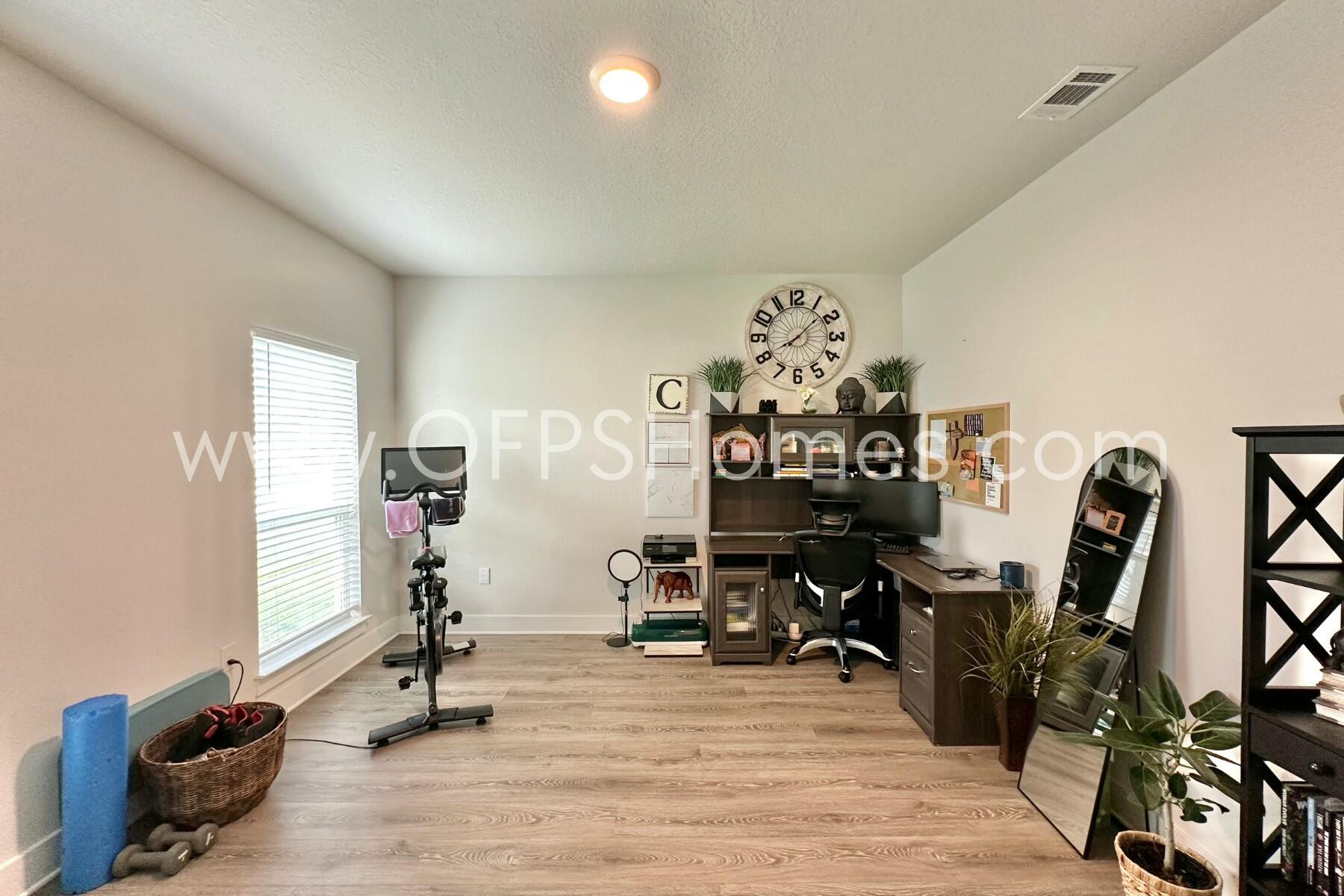 2412 Dakota Way Crestview, FL 32536 - Photo 43 of 43 a view of a room with gym equipment