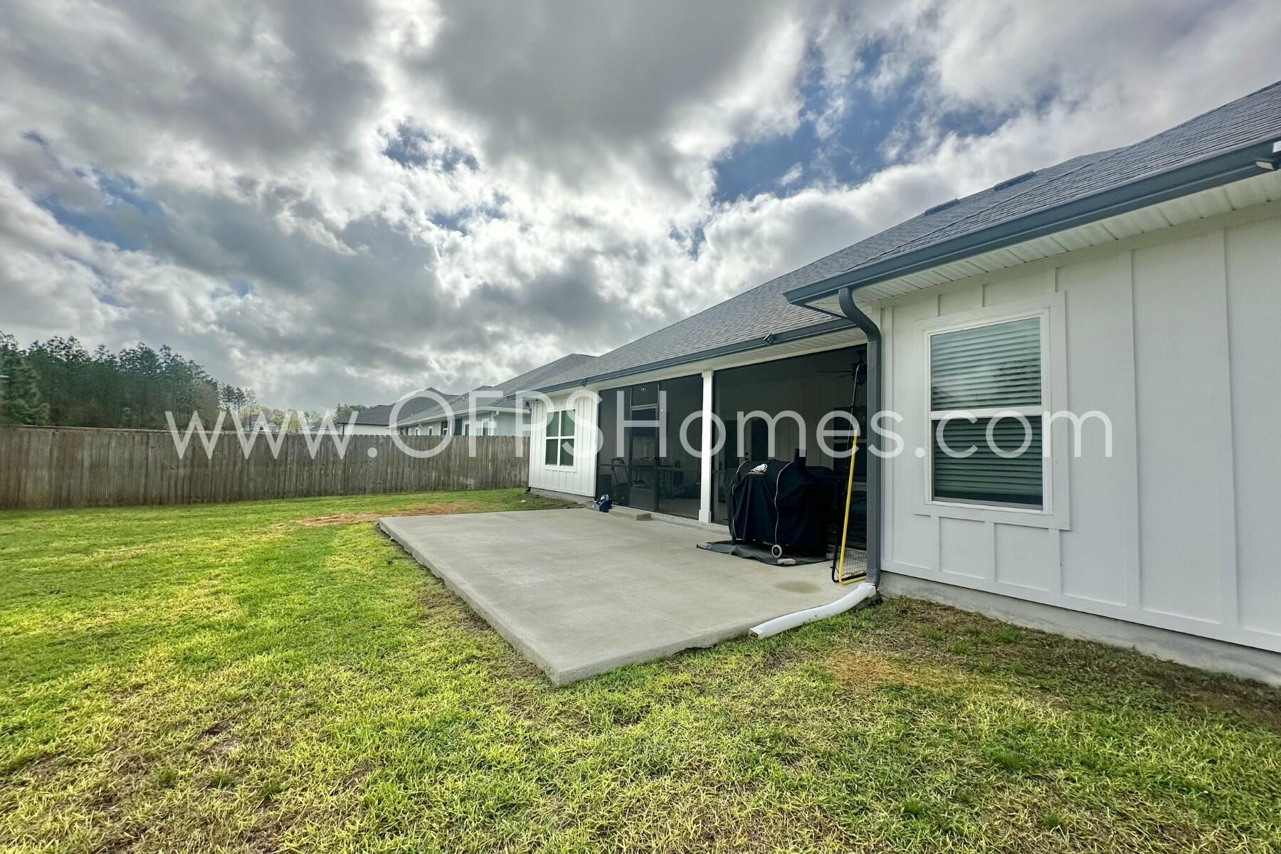 2412 Dakota Way Crestview, FL 32536 - Photo 5 of 43 a view of a house with backyard and porch