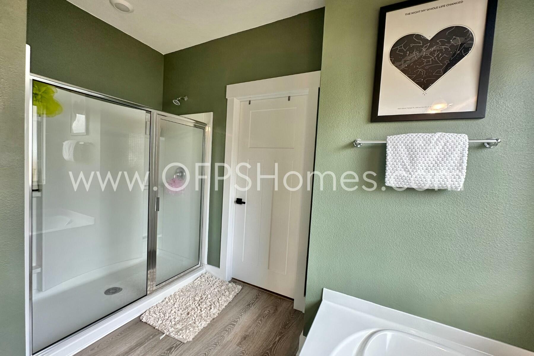 2412 Dakota Way Crestview, FL 32536 - Photo 9 of 43 a bathroom with a shower and a toilet