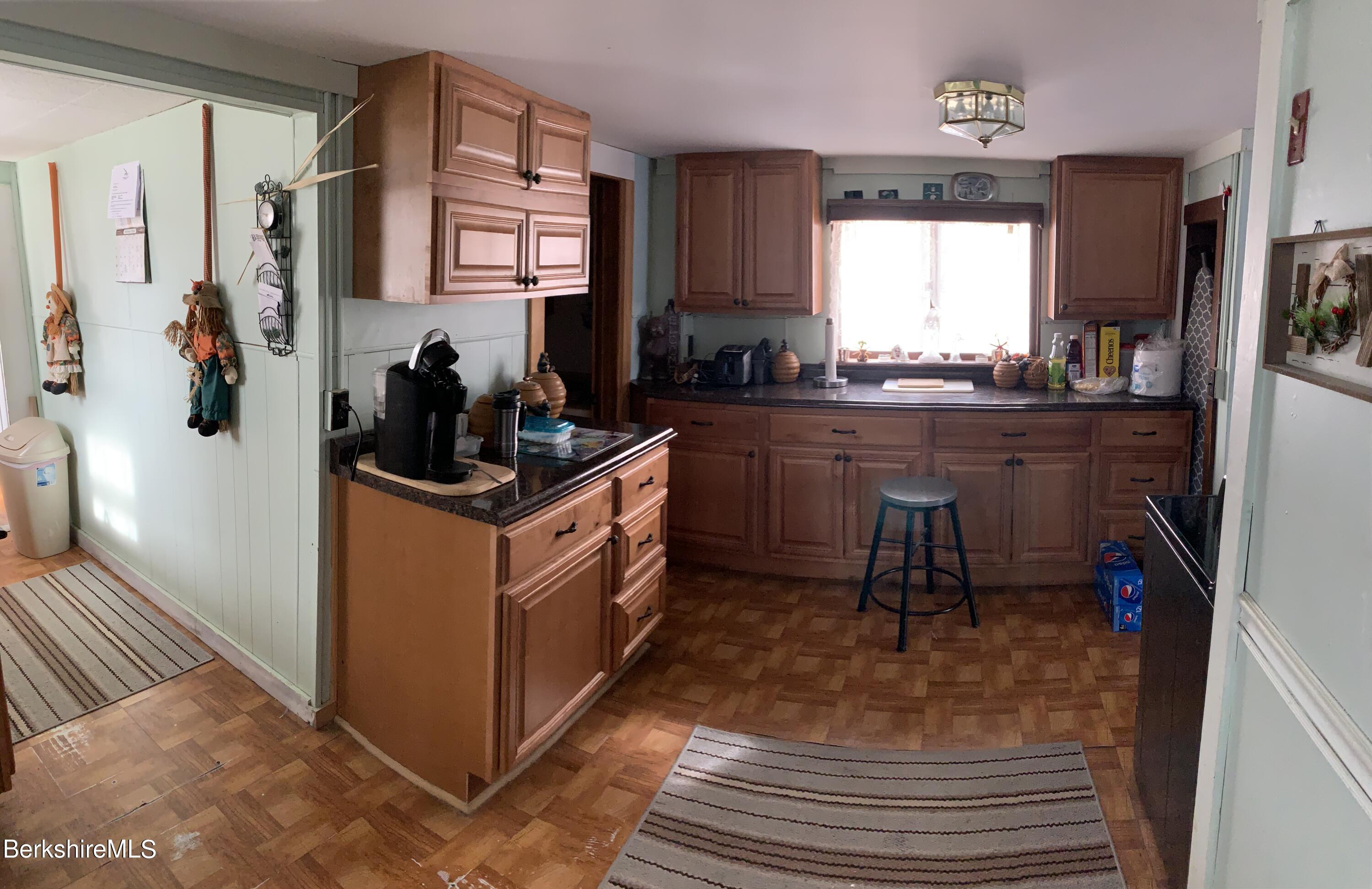 20 Prospect Street Adams, MA 01220 - Photo 16 of 40 a kitchen with wooden cabinets and sink