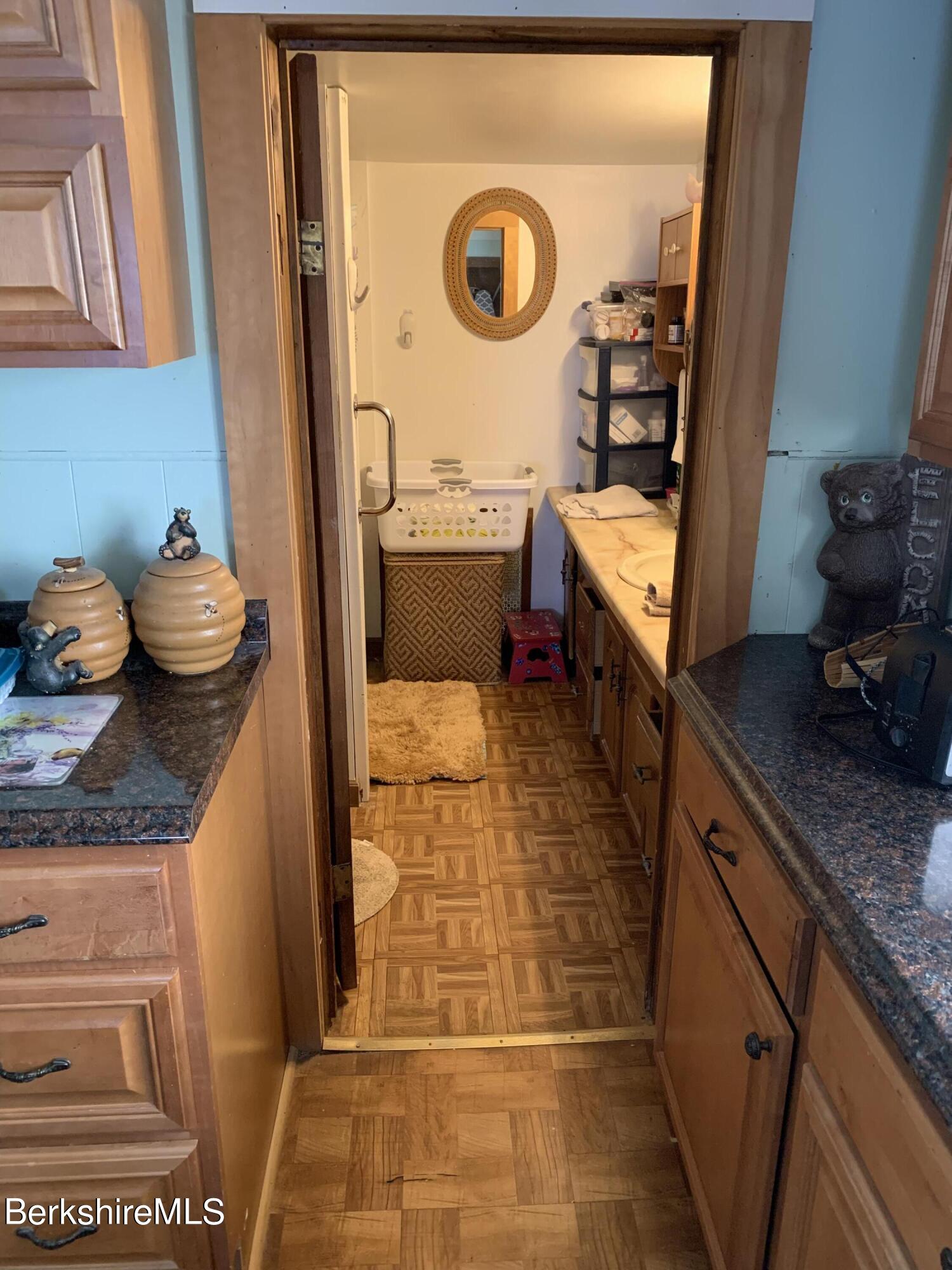 20 Prospect Street Adams, MA 01220 - Photo 18 of 40 a bathroom with a sink and a mirror