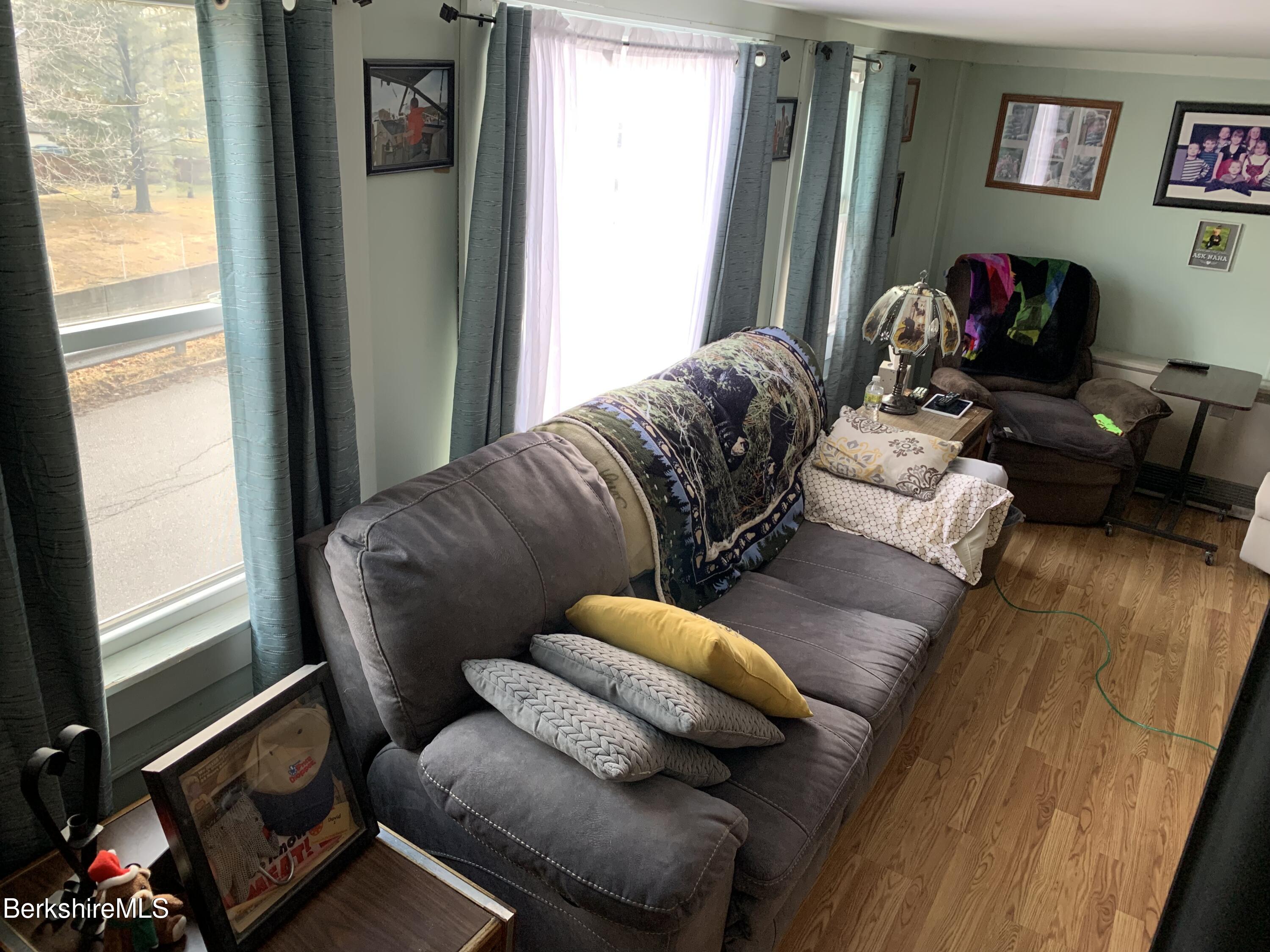 20 Prospect Street Adams, MA 01220 - Photo 24 of 40 a living room with furniture and a window