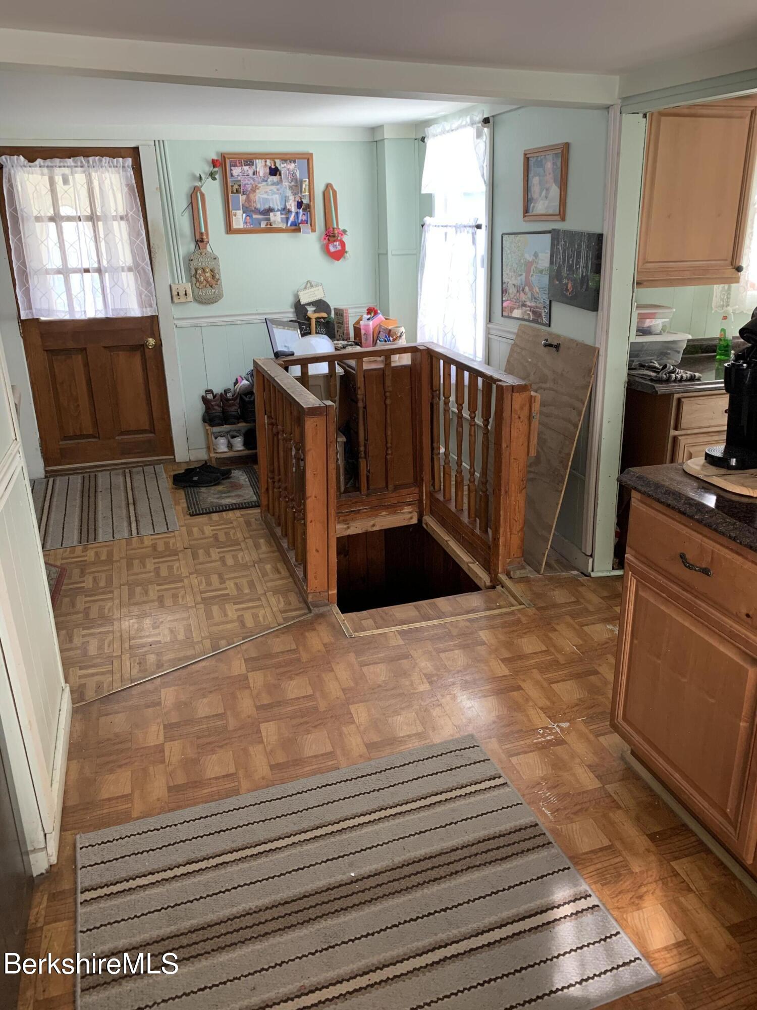 20 Prospect Street Adams, MA 01220 - Photo 33 of 40 a living room with furniture and a flat screen tv