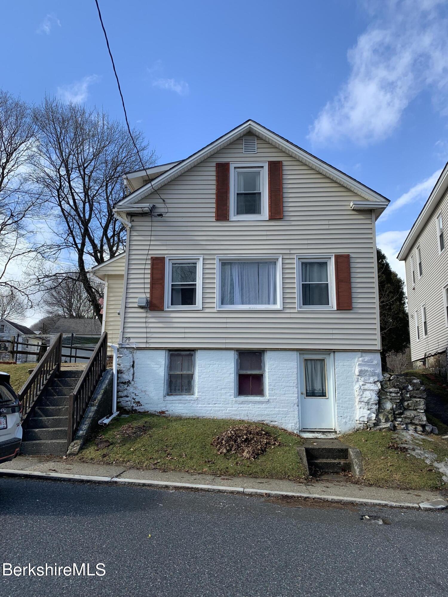 20 Prospect Street Adams, MA 01220 - Photo 7 of 40 a front view of a house with a yard