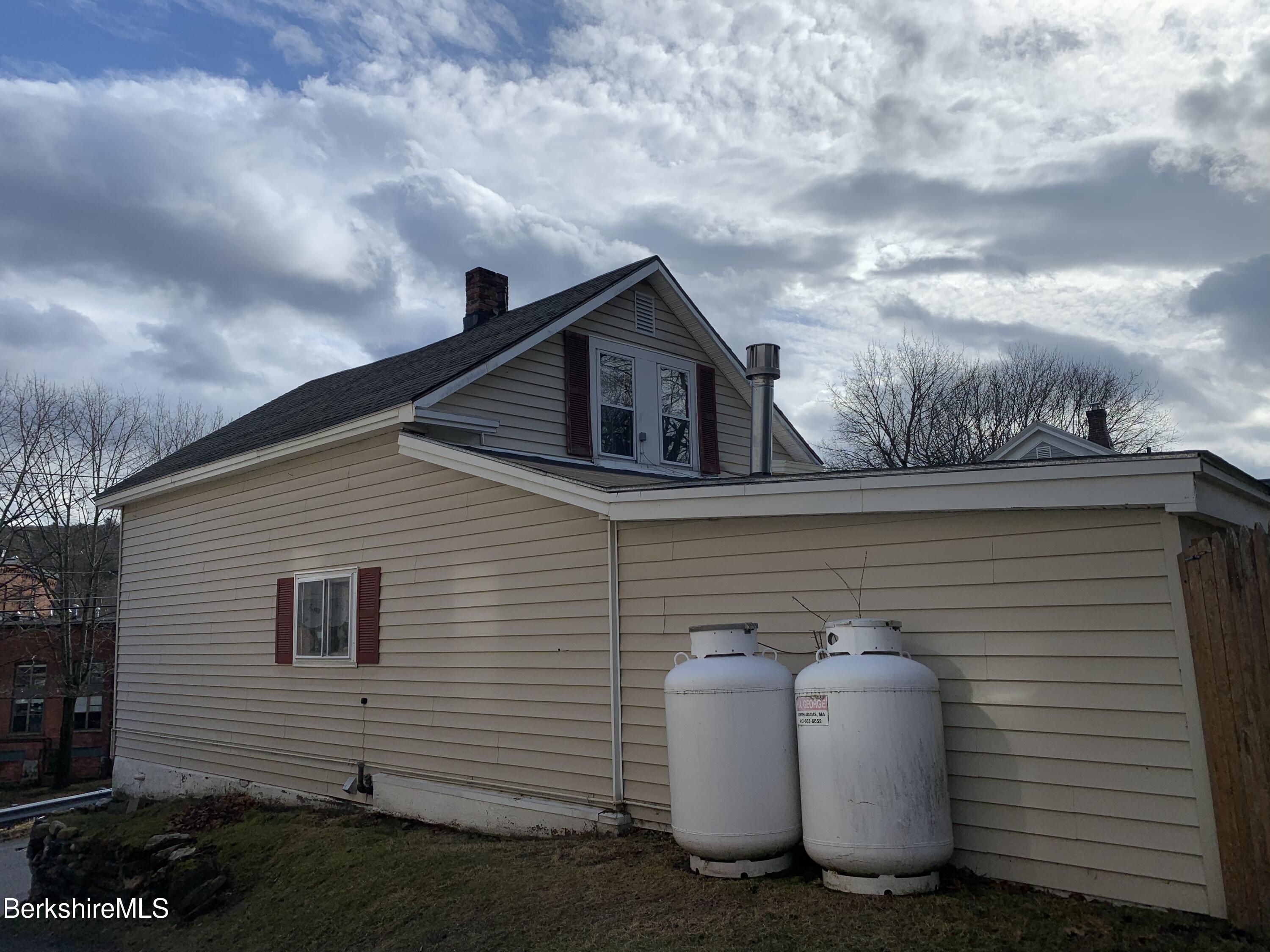 20 Prospect Street Adams, MA 01220 - Photo 9 of 40 a view of a house with backyard