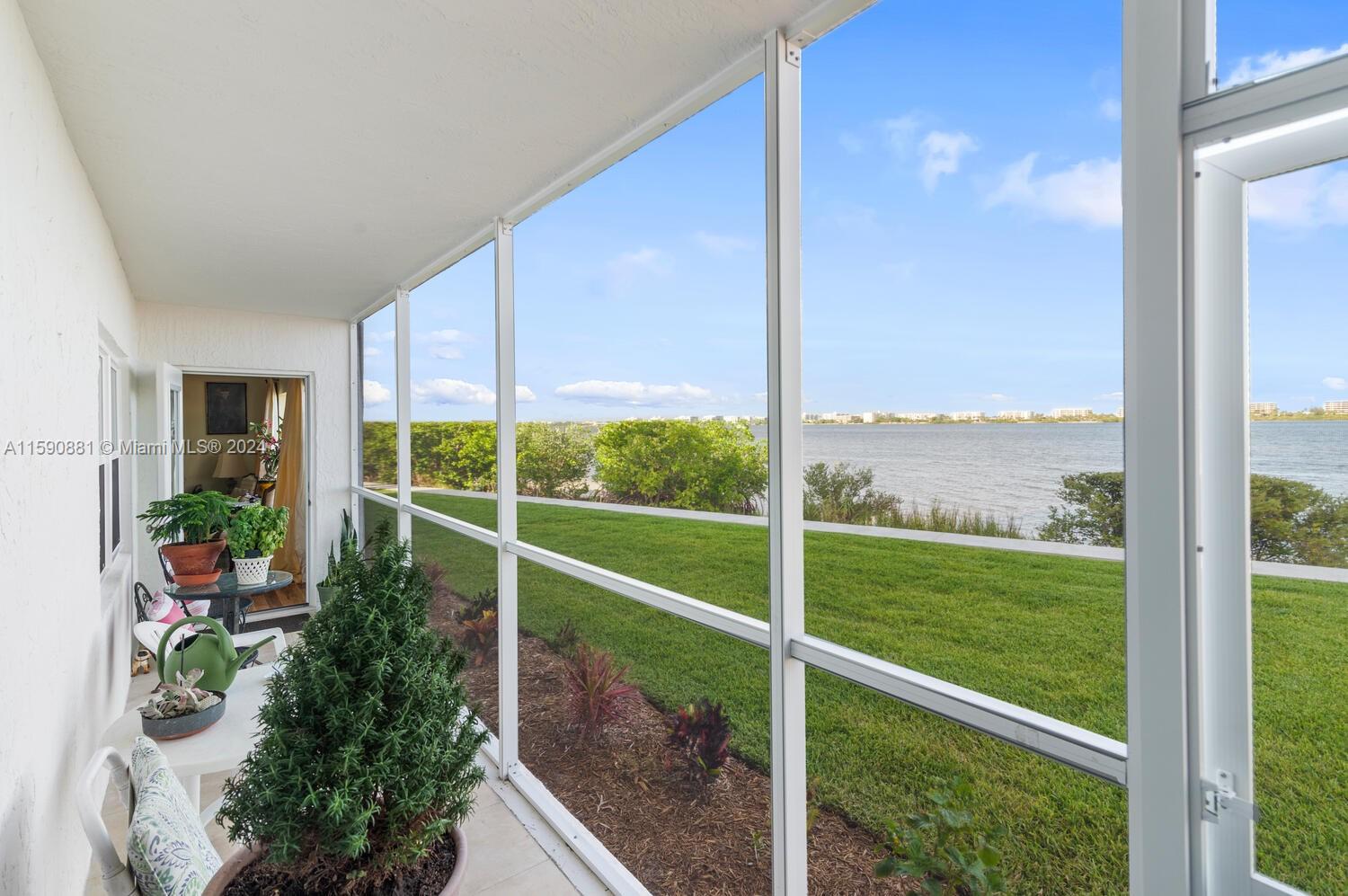 1502 South Lakeside Drive, Unit 112 Lake Worth, FL 33460 - Photo 1 of 21 a view of outdoor space and yard