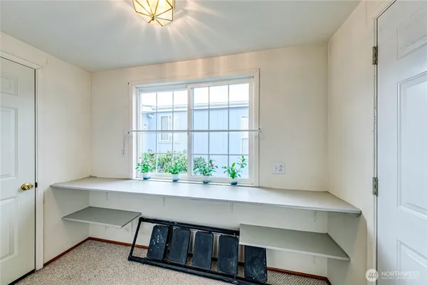 a view of table room and window