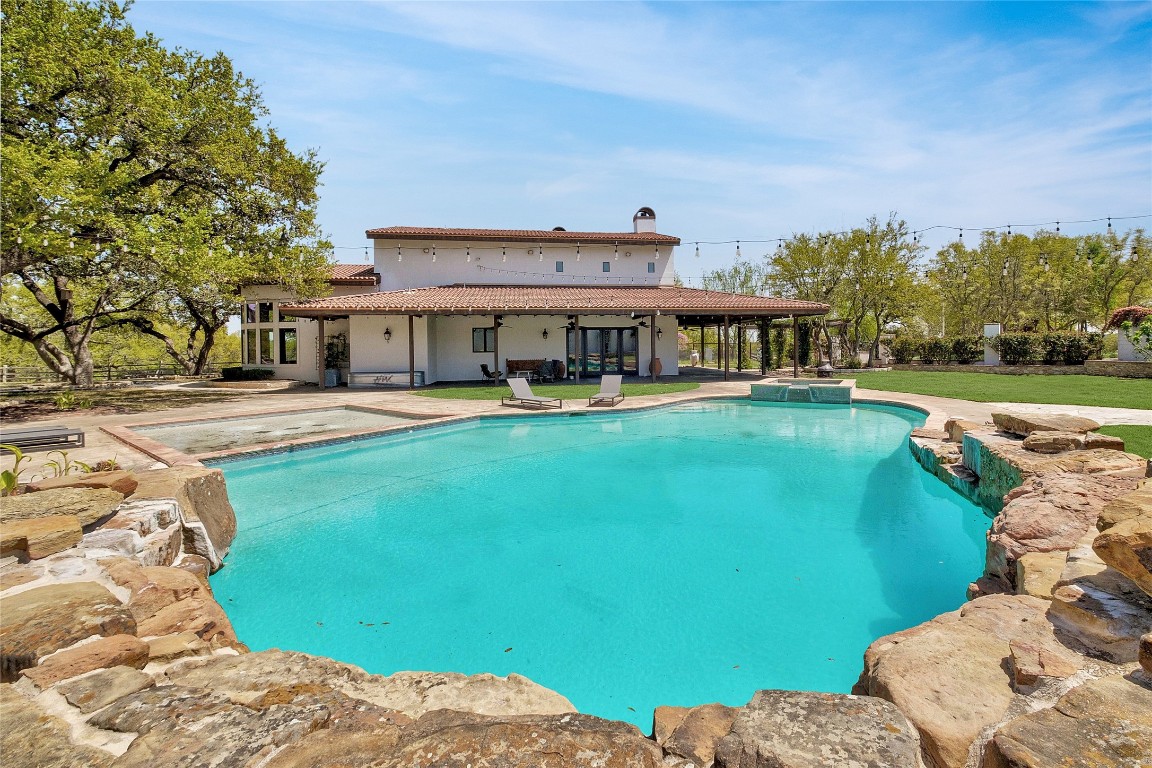9770 Farm To Market 967 Buda, TX 78610 - Photo 32 of 40 an aerial view of a house with swimming pool garden and patio