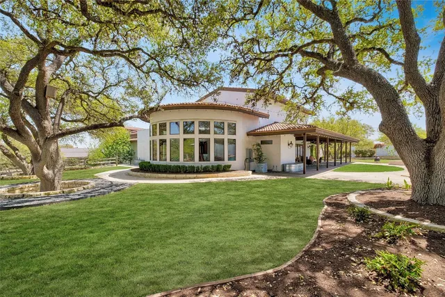a view of a garden and a patio