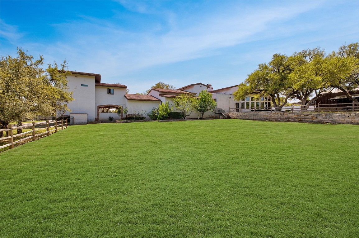 9770 Farm To Market 967 Buda, TX 78610 - Photo 36 of 40 a view of a building with a yard