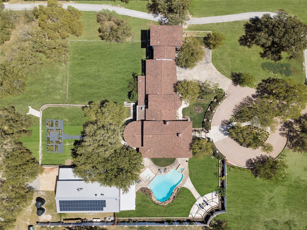 9770 Farm To Market 967 Buda, TX 78610 - Photo 39 of 40 an aerial view of a house with a yard