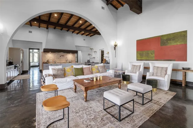 a living room with furniture and a rug