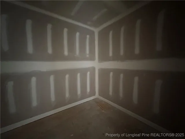 a bathroom with a granite countertop sink a bathtub and a shower