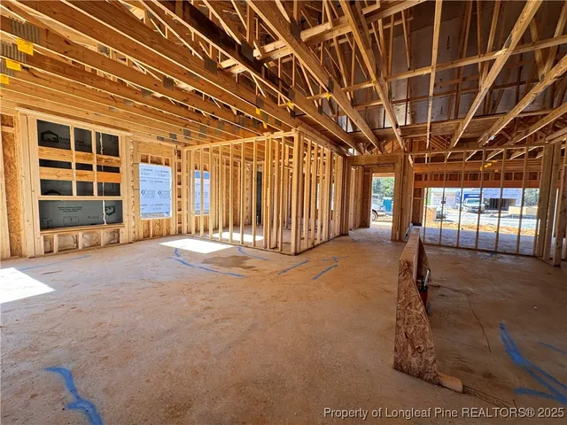 a view of a room with wooden walls